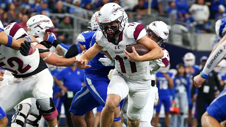 Quarterback Bryce Ullman of Ganado carries in the Texas 2A Division 1 championship game at AT&T Stadium.
