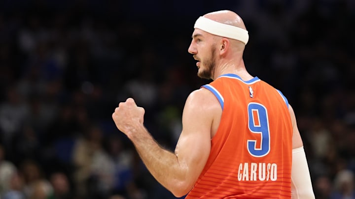 Dec 19, 2024; Orlando, Florida, USA; Oklahoma City Thunder guard Alex Caruso (9) reacts after a play against the Orlando Magic in the second quarter at Kia Center. Mandatory Credit: Nathan Ray Seebeck-Imagn Images Dec 19, 2024; Orlando, Florida, USA; Oklahoma City Thunder guard Alex Caruso (9) reacts after a play against the Orlando Magic in the second quarter at Kia Center. Mandatory Credit: Nathan Ray Seebeck-Imagn Images