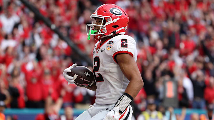 Dec 30, 2023; Miami Gardens, FL, USA; Georgia Bulldogs running back Kendall Milton (2) reacts after Dec 30, 2023; Miami Gardens, FL, USA; Georgia Bulldogs running back Kendall Milton (2) reacts after