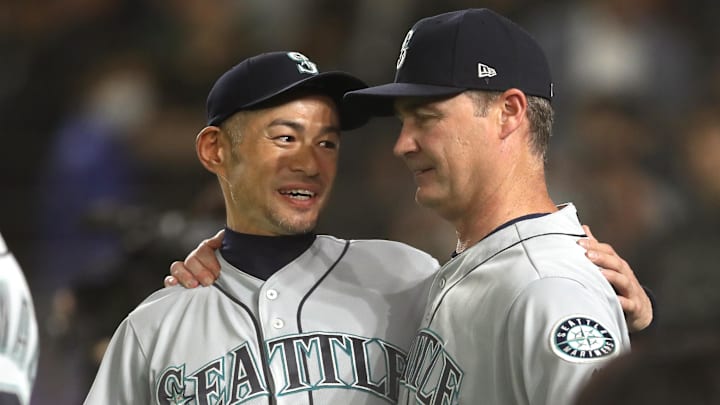 Seattle Mariners right fielder Ichiro Suzuki (left) and manager Scott Servais before a game against the Oakland Athletics on March 21, 2019, at the Tokyo Dome.