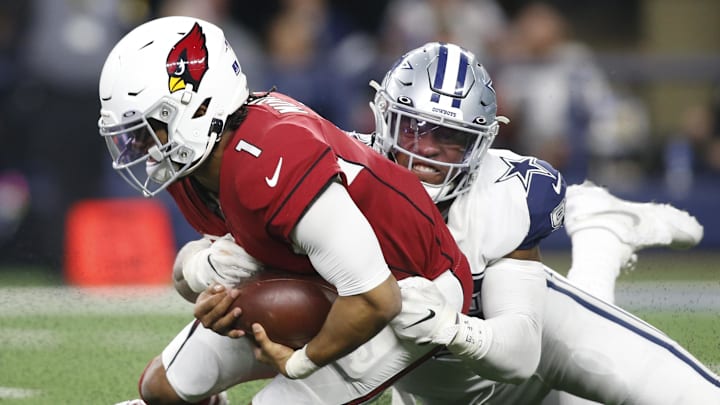 Arizona Cardinals quarterback Kyler Murray is sacked by the Dallas Cowboys defense at AT&T Stadium 