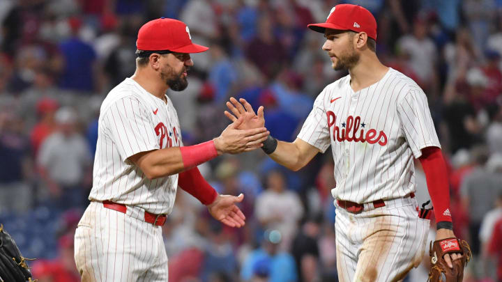Jun 17, 2024; Philadelphia, Pennsylvania, USA; Philadelphia Phillies designated hitter Kyle Schwarber (12) and shortstop Trea Turner (7) celebrate win against the San Diego Padres at Citizens Bank Park. Jun 17, 2024; Philadelphia, Pennsylvania, USA; Philadelphia Phillies designated hitter Kyle Schwarber (12) and shortstop Trea Turner (7) celebrate win against the San Diego Padres at Citizens Bank Park.