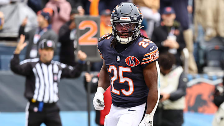 Oct 19, 2025; Chicago, Illinois, USA; Chicago Bears running back Kyle Monangai (25) reacts after rushing for a touchdown against the New Orleans Saints during the second quarter at Soldier Field. Mandatory Credit: Mike Dinovo-Imagn Images