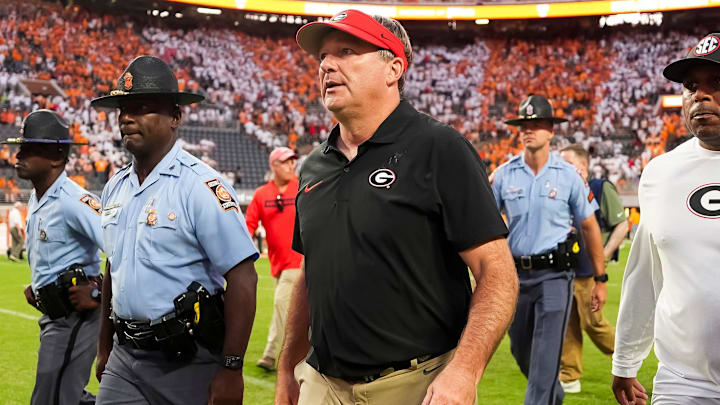 Georgia head coach Kirby Smart walks off the field after an overtime win against Tennessee at Neyland Stadium in Knoxville, Tenn., on Sept. 13, 2025.