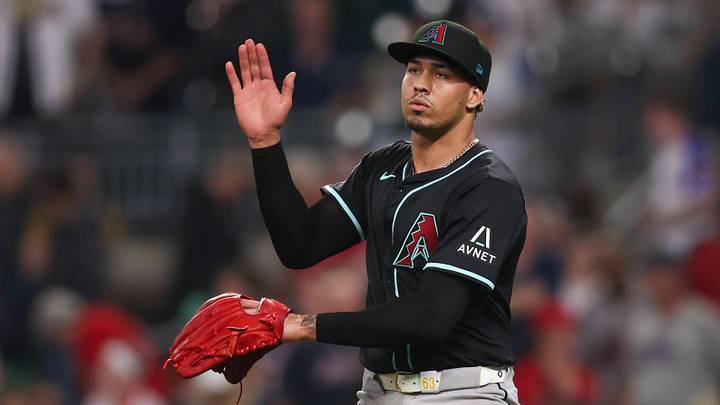 Jun 4, 2025; Atlanta, Georgia, USA; Arizona Diamondbacks relief pitcher Justin Martinez (63) celebrates after a victory over the Atlanta Braves at Truist Park. Mandatory Credit: Brett Davis-Imagn Images Jun 4, 2025; Atlanta, Georgia, USA; Arizona Diamondbacks relief pitcher Justin Martinez (63) celebrates after a victory over the Atlanta Braves at Truist Park. Mandatory Credit: Brett Davis-Imagn Images