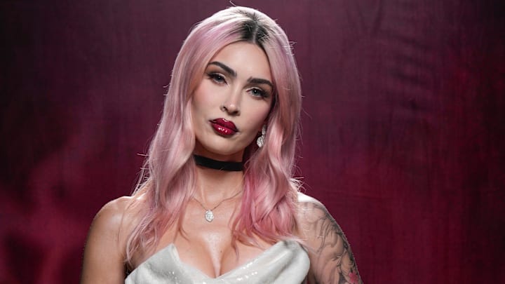 Megan Fox posing for a photo Megan Fox posing for a photo