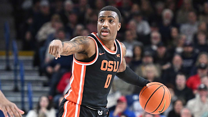 Jan 28, 2025; Spokane, Washington, USA; Oregon State Beavers guard Damarco Minor (0) controls the ball against the Gonzaga Bulldogs in the first half at McCarthey Athletic Center. Mandatory Credit: James Snook-Imagn Images