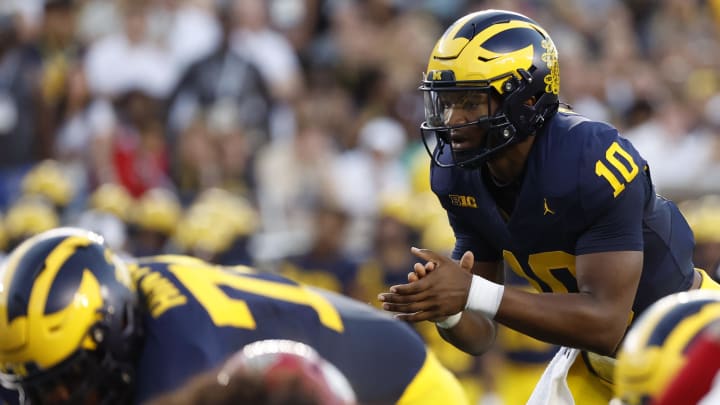 Aug 31, 2024; Ann Arbor, Michigan, USA; Michigan Wolverines quarterback Alex Orji (10) waits for the snap against the Fresno State Bulldogs in the first half at Michigan Stadium. Mandatory Credit: Rick Osentoski-USA TODAY Sports Aug 31, 2024; Ann Arbor, Michigan, USA; Michigan Wolverines quarterback Alex Orji (10) waits for the snap against the Fresno State Bulldogs in the first half at Michigan Stadium. Mandatory Credit: Rick Osentoski-USA TODAY Sports