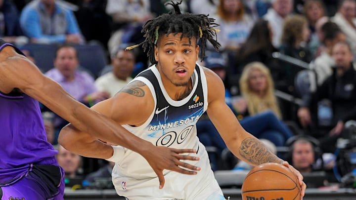 Dec 2, 2024; Minneapolis, Minnesota, USA; Minnesota Timberwolves guard Terrence Shannon Jr. (00) dribbles against the Los Angeles Lakers in the fourth quarter at Target Center. Mandatory Credit: Brad Rempel-Imagn Images