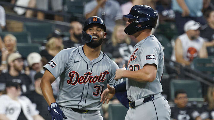 Chicago, Illinois, USA; Detroit Tigers first baseman Spencer Torkelson (20) celebrates with outfielder Riley Greene (31) after they both scored against the Chicago White Sox during the fourth inning at Guaranteed Rate Field.