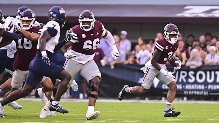 Sep 14, 2024; Starkville, Mississippi, USA; Mississippi State Bulldogs wide receiver Kevin Coleman Jr. (3) runs the ball against the Toledo Rockets during the first quarter at Davis Wade Stadium at Scott Field. Mandatory Credit: Matt Bush-Imagn Images