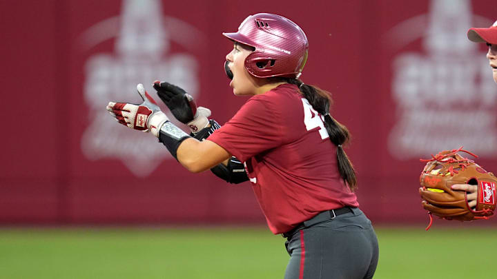 Oklahoma's Gabbie Garcia celebrates after hitting a double during the Oklahoma Battle Series at Love's Field. Oklahoma's Gabbie Garcia celebrates after hitting a double during the Oklahoma Battle Series at Love's Field.