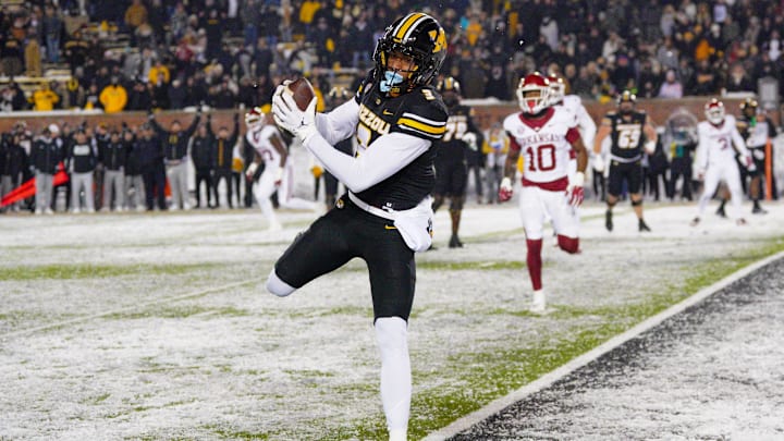 Missouri Tigers wide receiver Luther Burden III catches a pass for a two-point conversion against the Arkansas Razorbacks.