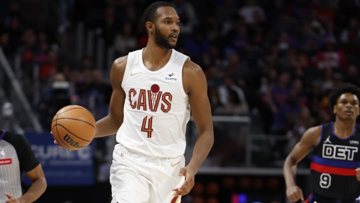 Mar 1, 2024; Detroit, Michigan, USA;  Cleveland Cavaliers forward Evan Mobley (4) dribbles in the first half against the Detroit Pistons at Little Caesars Arena. Mandatory Credit: Rick Osentoski-USA TODAY Sports