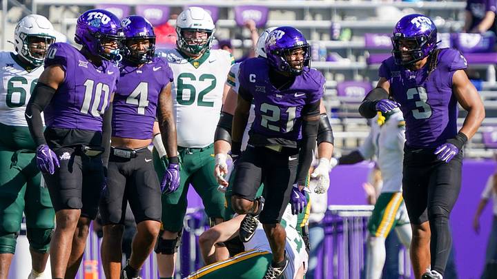 Oct 18, 2025; Fort Worth, Texas, USA; TCU Horned Frogs safety Bud Clark (21) reacts after sacking Baylor Bears quarterback Sawyer Robertson (13) during the second half of a game at Amon G. Carter Stadium. Mandatory Credit: Raymond Carlin III-Imagn Images Oct 18, 2025; Fort Worth, Texas, USA; TCU Horned Frogs safety Bud Clark (21) reacts after sacking Baylor Bears quarterback Sawyer Robertson (13) during the second half of a game at Amon G. Carter Stadium. Mandatory Credit: Raymond Carlin III-Imagn Images