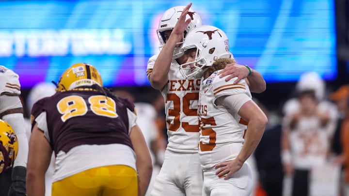 Jan 1, 2025; Atlanta, GA, USA; Texas Longhorns place kicker Bert Auburn (45) and punter Michael Kern (39) react after a missed field goal against the Arizona State Sun Devils at Mercedes-Benz Stadium. Mandatory Credit: Brett Davis-Imagn Images