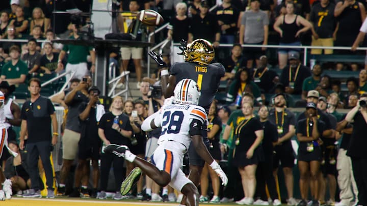 Aug 29, 2025; Waco, Texas: Baylor Bears tight end Michael Trigg catches a touchdown pass against Auburn Tigers safety Kensley Louidor-Faustin during the second half at McLane Stadium. Mandatory Credit: Chris Jones-Imagn Images