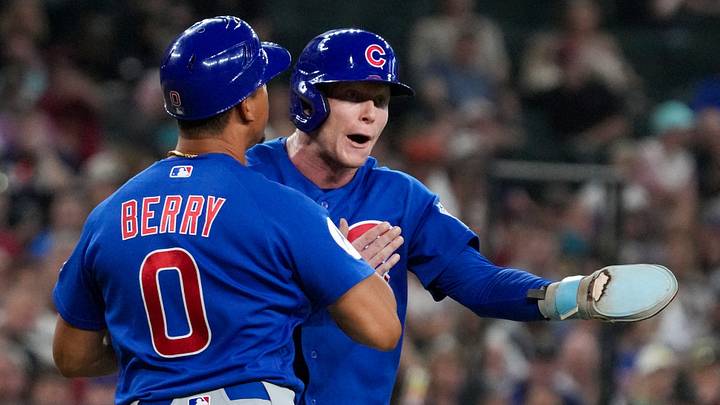 Aug 26, 2026; Phoenix, Arizona, USA; Chicago Cubs center fielder Pete Crow-Armstrong (4) has to be held back by third base coach Quintin Berry (0) after a non balk call in the sixth inning against the Arizona Diamondbacks at Chase Field. Mandatory Credit: Rick Scuteri-Imagn Images Aug 26, 2026; Phoenix, Arizona, USA; Chicago Cubs center fielder Pete Crow-Armstrong (4) has to be held back by third base coach Quintin Berry (0) after a non balk call in the sixth inning against the Arizona Diamondbacks at Chase Field. Mandatory Credit: Rick Scuteri-Imagn Images