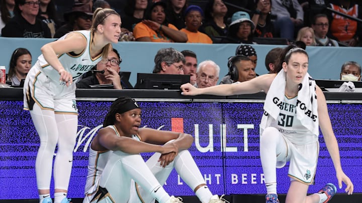 May 27, 2025; Brooklyn, New York, USA;  New York Liberty guard Sabrina Ionescu (20), center Jonquel Jones (35), and  forward Breanna Stewart (30) at Barclays Center. Mandatory Credit: Wendell Cruz-Imagn Images