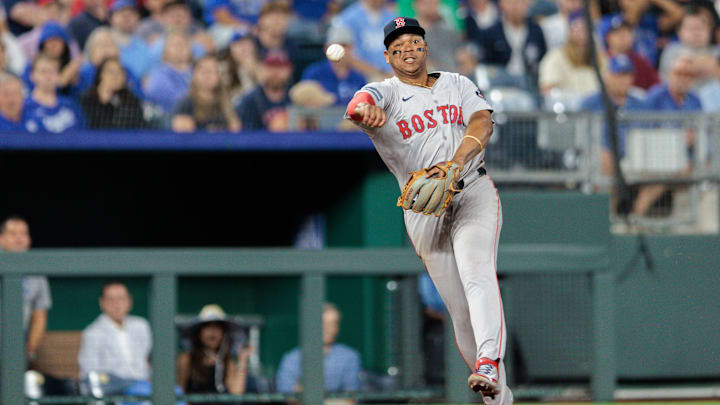 Aug 6, 2024; Kansas City, Missouri, USA; Boston Red Sox third base Rafael Devers (11) throws to first base during the eighth inning Kansas City Royals at Kauffman Stadium. Mandatory Credit: William Purnell-Imagn Images Aug 6, 2024; Kansas City, Missouri, USA; Boston Red Sox third base Rafael Devers (11) throws to first base during the eighth inning Kansas City Royals at Kauffman Stadium. Mandatory Credit: William Purnell-Imagn Images