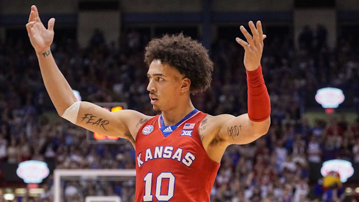 Feb 28, 2023; Lawrence, Kansas, USA; Kansas Jayhawks forward Jalen Wilson (10) celebrates toward fans against the Texas Tech Red Raiders during the first half at Allen Fieldhouse. Mandatory Credit: Denny Medley-Imagn Images Feb 28, 2023; Lawrence, Kansas, USA; Kansas Jayhawks forward Jalen Wilson (10) celebrates toward fans against the Texas Tech Red Raiders during the first half at Allen Fieldhouse. Mandatory Credit: Denny Medley-Imagn Images
