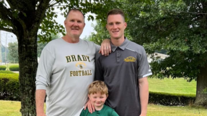 Rob Clauss (left) with sons Jesse (right) and Henry