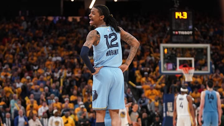 Memphis Grizzlies guard Ja Morant (12) interacts with players from the Golden State Warriors team bench in the fourth quarter at the Chase Center. Mandatory Credit: Cary Edmondson-Imagn Images Memphis Grizzlies guard Ja Morant (12) interacts with players from the Golden State Warriors team bench in the fourth quarter at the Chase Center. Mandatory Credit: Cary Edmondson-Imagn Images