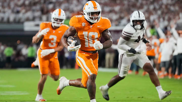Tennessee running back DeSean Bishop (18) runs to the end zone for a touchdown during overtime in a college football game between Tennessee and Mississippi State at Davis Wade Stadium in Starkville, Miss., on Sept. 27, 2025. Tennessee running back DeSean Bishop (18) runs to the end zone for a touchdown during overtime in a college football game between Tennessee and Mississippi State at Davis Wade Stadium in Starkville, Miss., on Sept. 27, 2025.