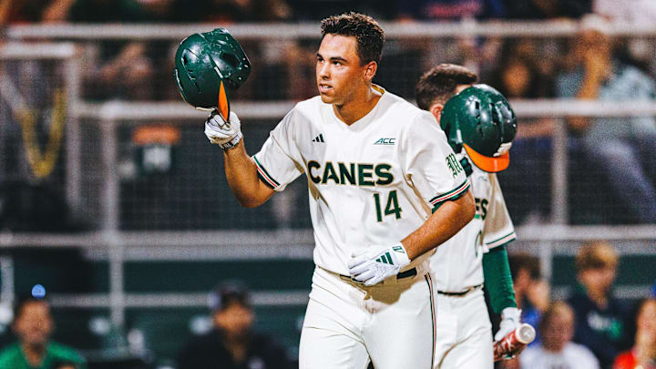 Miami Hurricanes third baseman Daniel Cuvet launches a ball out of the park for a home run against Notre Dame. Miami Hurricanes third baseman Daniel Cuvet launches a ball out of the park for a home run against Notre Dame.
