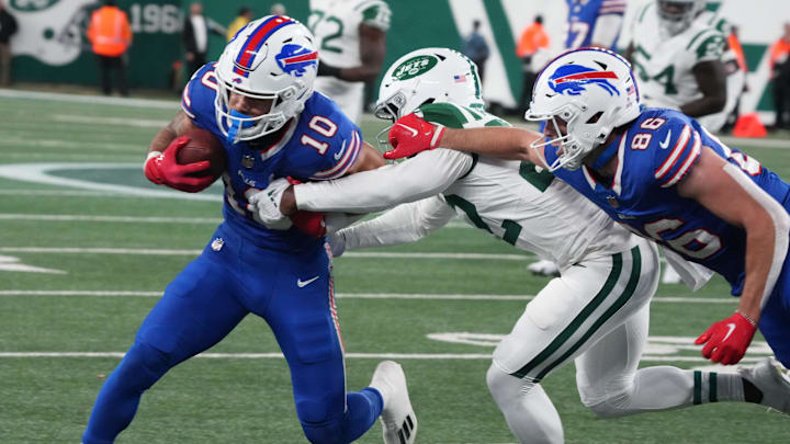 East Rutherford, NJ -- October 14, 2024 -- Khalil Shakir of Buffalo and Tony Adams of the Jets in the first half. The Buffalo Bills came to MetLife Stadium to play the NY Jets. The Jets played their first game under new interim head coach Jeff Ulbrich.