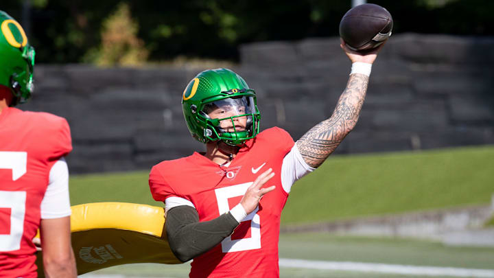 Oregon quarterback Dillon Gabriel throws out a pass during practice with the Oregon Ducks Tuesday, Aug. 20, 2024 at the Hatfield-Dowlin Complex in Eugene, Ore.