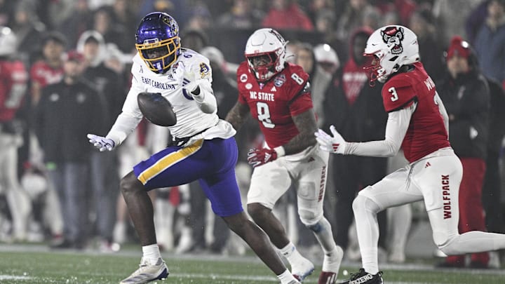Dec 28, 2024; Annapolis, MD, USA;  *East Carolina Pirates tight end Desirrio Riles (6) catches a bobbled pass during the first half of the Go Bowling Military Bowl against the North Carolina State Wolfpack at Navy-Marine Corps Memorial Stadium. Mandatory Credit: Tommy Gilligan-Imagn Images