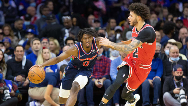 Nov 3, 2021; Philadelphia, Pennsylvania, USA; Philadelphia 76ers guard Tyrese Maxey (0) dribbles the ball against Chicago Bulls guard Lonzo Ball (2) during the second quarter at Wells Fargo Center. Mandatory Credit: Bill Streicher-USA TODAY Sports