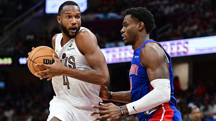 Oct 25, 2024; Cleveland, Ohio, USA; Cleveland Cavaliers forward Evan Mobley (4) drives to the basket against Detroit Pistons center Jalen Duren (0) during the second half at Rocket Mortgage FieldHouse. Mandatory Credit: Ken Blaze-Imagn Images