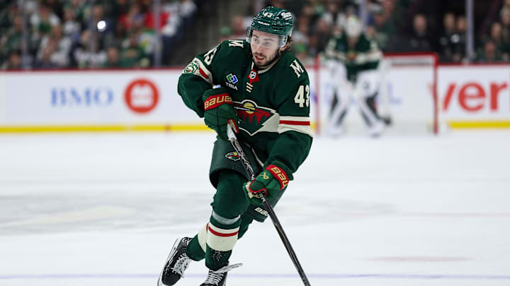 May 11, 2026; Saint Paul, Minnesota, USA; Minnesota Wild defenseman Quinn Hughes (43) skates with the puck against the Colorado Avalanche during the second period in game four of the second round of the 2026 Stanley Cup Playoffs at Grand Casino Arena. Mandatory Credit: Matt Krohn-Imagn Images