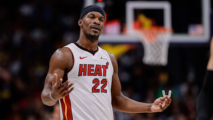 Feb 29, 2024; Denver, Colorado, USA; Miami Heat forward Jimmy Butler (22) reacts after a play in the second quarter against the Denver Nuggets at Ball Arena. Mandatory Credit: Isaiah J. Downing-Imagn Images