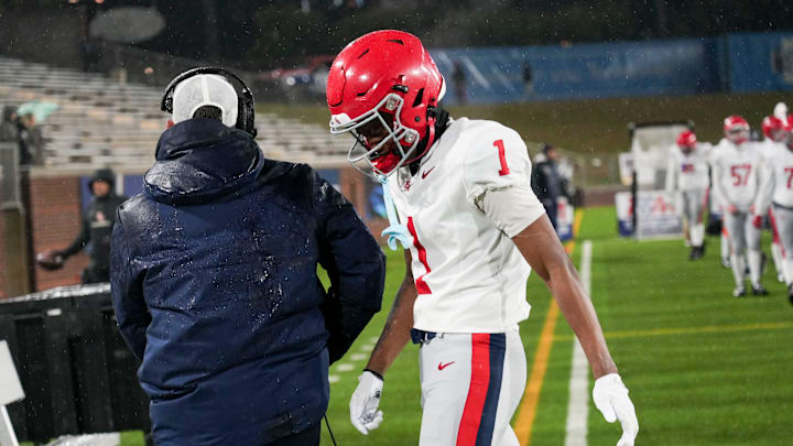 Brentwood Academy's Kesean Bowman (1) makes his way to the bench as the Eagles fail to convert a 4th and long, sealing their defeat during the Division II-AAA Championship match between Baylor versus. Brentwood Academy in Finley Stadium, Chattanooga, Tenn., on Thursday, Dec. 4, 2025.