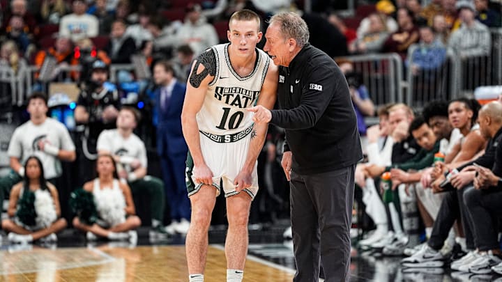 Michigan State head coach Tom Izzo talks to guard Denham Wojcik (10) before a play against UCLA during the first half of Big Ten tournament quarterfinal at United Center in Chicago on Friday, March 13, 2026. Michigan State head coach Tom Izzo talks to guard Denham Wojcik (10) before a play against UCLA during the first half of Big Ten tournament quarterfinal at United Center in Chicago on Friday, March 13, 2026.