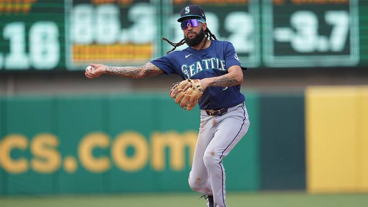 May 27, 2026; West Sacramento, California, USA; Seattle Mariners shortstop J.P. Crawford (3) turns a double play against the Athletics in the ninth inning at Sutter Health Park. Mandatory Credit: Cary Edmondson-Imagn Images