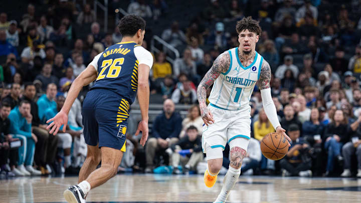 Nov 19, 2025; Indianapolis, Indiana, USA; Charlotte Hornets guard LaMelo Ball (1) dribbles the ball while Indiana Pacers guard Ben Sheppard (26) defends in the first half at Gainbridge Fieldhouse. Mandatory Credit: Trevor Ruszkowski-Imagn Images Nov 19, 2025; Indianapolis, Indiana, USA; Charlotte Hornets guard LaMelo Ball (1) dribbles the ball while Indiana Pacers guard Ben Sheppard (26) defends in the first half at Gainbridge Fieldhouse. Mandatory Credit: Trevor Ruszkowski-Imagn Images