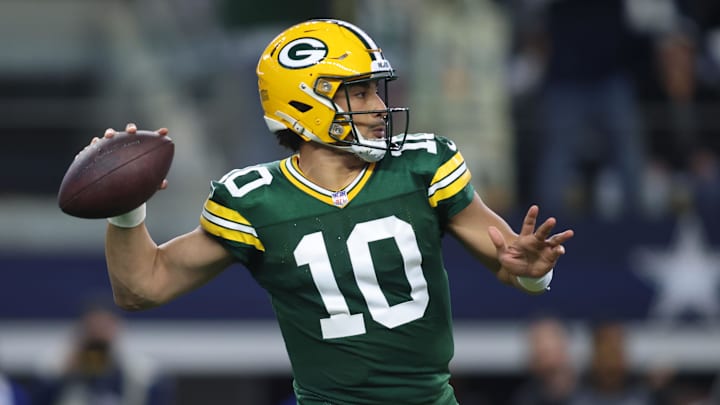 Jan 14, 2024; Arlington, Texas, USA;Green Bay Packers quarterback Jordan Love (10) drops back to
