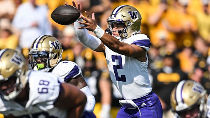 Oct 12, 2024; Iowa City, Iowa, USA; Washington Huskies quarterback Demond Williams Jr. (2) takes a direct snap against the Iowa Hawkeyes during the second quarter at Kinnick Stadium. Mandatory Credit: Jeffrey Becker-Imagn Images