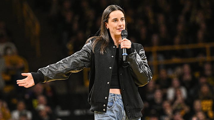 Feb 2, 2025; Iowa City, Iowa, USA; Former Iowa Hawkeyes player Caitlin Clark speaks after the game at Carver-Hawkeye Arena against the USC Trojans. The Hawkeyes retired Clark’s jersey after the game. Mandatory Credit: Jeffrey Becker-Imagn Images