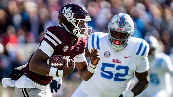 Mississippi State quarterback Kamario Taylor (1) carries the ball during a college football game between Mississippi State and Ole Miss at Davis Wade Stadium in Starkville, Miss., on Friday, Nov. 28, 2025. Ole Miss defeated Mississippi State 38-19 in the Egg Bowl. Mississippi State quarterback Kamario Taylor (1) carries the ball during a college football game between Mississippi State and Ole Miss at Davis Wade Stadium in Starkville, Miss., on Friday, Nov. 28, 2025. Ole Miss defeated Mississippi State 38-19 in the Egg Bowl.
