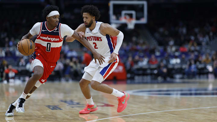 Nov 17, 2024; Washington, District of Columbia, USA; Washington Wizards guard Bilal Coulibaly (0) drives to the basket as Detroit Pistons guard Cade Cunningham (2) defends in the second half at Capital One Arena. Mandatory Credit: Geoff Burke-Imagn Images