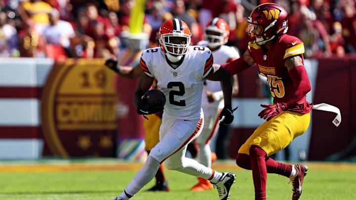Oct 6, 2024; Landover, Maryland, USA; Cleveland Browns wide receiver Amari Cooper (2) runs the ball against a catch against Washington Commanders cornerback Benjamin St-Juste (25) during the second quarter at NorthWest Stadium.