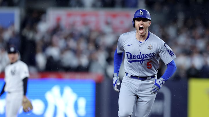 Oct 29, 2024; New York, New York, USA; Los Angeles Dodgers first baseman Freddie Freeman (5) celebrates after hitting a two-run home run during the first inning in Game 4 of the 2024 MLB World Series against the New York Yankees at Yankee Stadium.