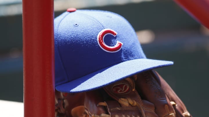 Apr 26, 2015; Cincinnati, OH, USA; A Chicago Cubs hat and glove sits in the dugout during a game with the Cincinnati Reds at Great American Ball Park. Mandatory Credit: David Kohl-Imagn Images Apr 26, 2015; Cincinnati, OH, USA; A Chicago Cubs hat and glove sits in the dugout during a game with the Cincinnati Reds at Great American Ball Park. Mandatory Credit: David Kohl-Imagn Images