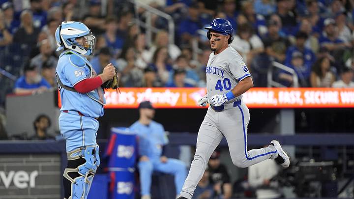 Aug 27, 2026; Toronto, Ontario, CAN;  Kansas City Royals third baseman Josh Rojas (40) scores a run in the sixth inning against the Toronto Blue Jays at Rogers Centre.  Mandatory Credit: John E. Sokolowski-Imagn Images