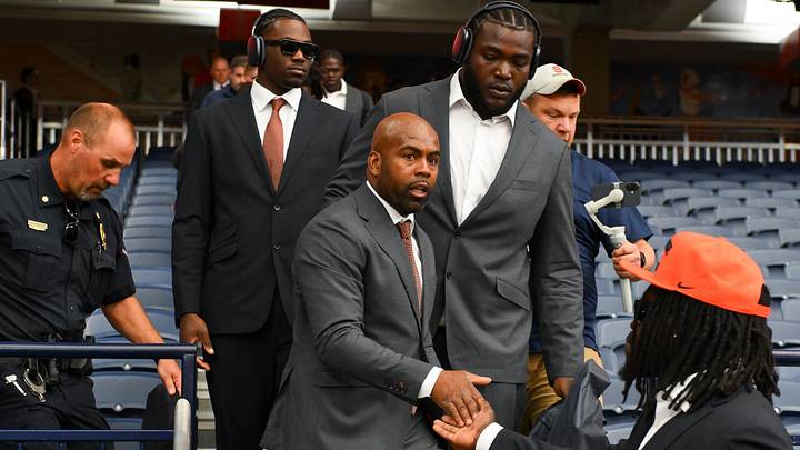 Sep 5, 2026; Syracuse, New York, USA; Syracuse Orange head coach Fran Brown (center) arrives at the JMA Wireless Dome with his team prior to the game against the New Hampshire Wildcats. Mandatory Credit: Rich Barnes-Imagn Images Sep 5, 2026; Syracuse, New York, USA; Syracuse Orange head coach Fran Brown (center) arrives at the JMA Wireless Dome with his team prior to the game against the New Hampshire Wildcats. Mandatory Credit: Rich Barnes-Imagn Images